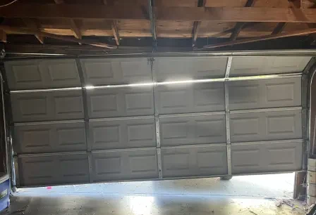 Crooked door re-aligned — before
